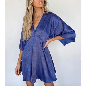 Vestique Blue Mini Romper, NWT deep v neckline and flowy sleeves